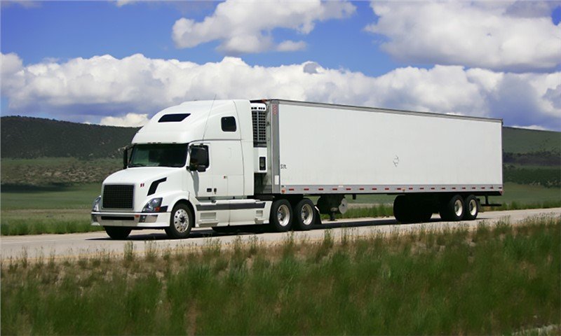 Long-haul truck carrying a piano move out of Vancouver for Always Best Moving