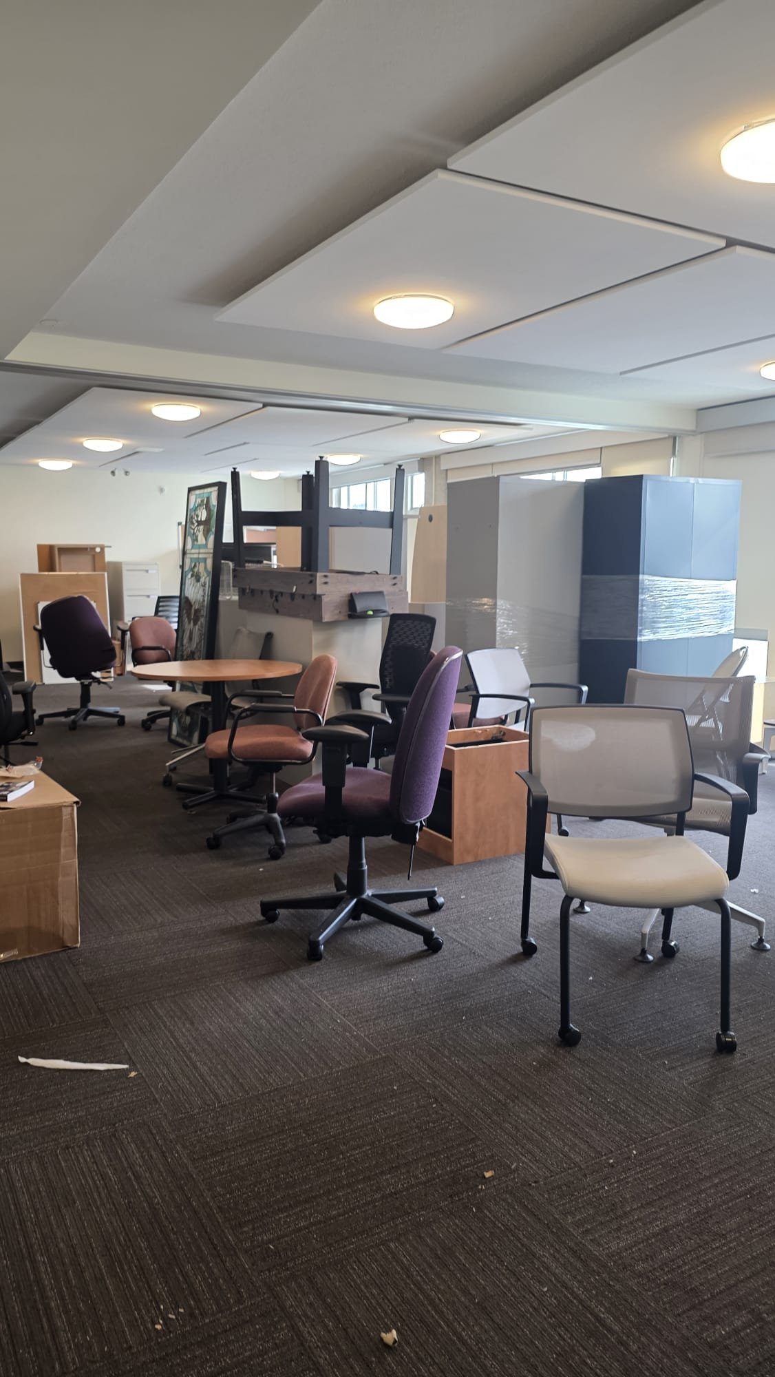 Always Best Moving Vancouver crew relocating a Vancouver office with desks and chairs staged